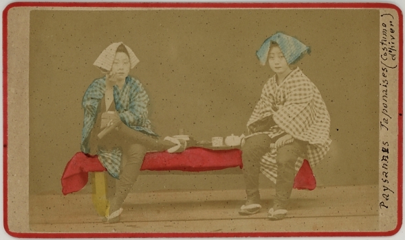 Hand tinted photograph of Japanese farmers in their winter costume.  Ca. 1875-80