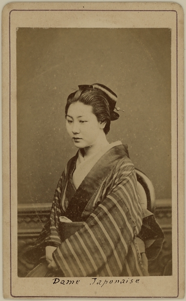 Japanese lady wearing a kimono.  Ca. 1875-80