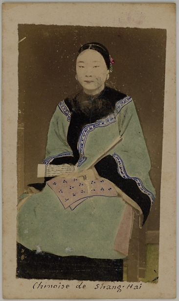 Handcolored photograph of a Chinese woman from Shanghai, China. Ca. 1875-80 by Chow Kwa, Hong Kong