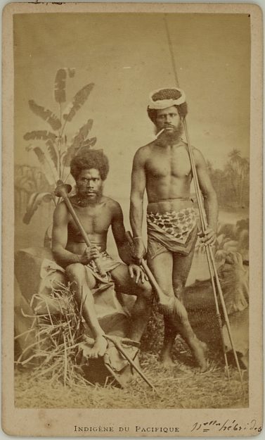 Portrait of two native men with weapons from the New Hebrides
