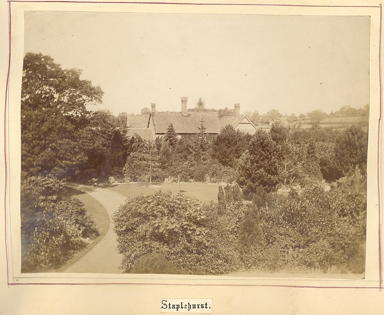 Staplehurst, Kent. View over gardens with house surrounded by trees. Photographed about 1875-80
